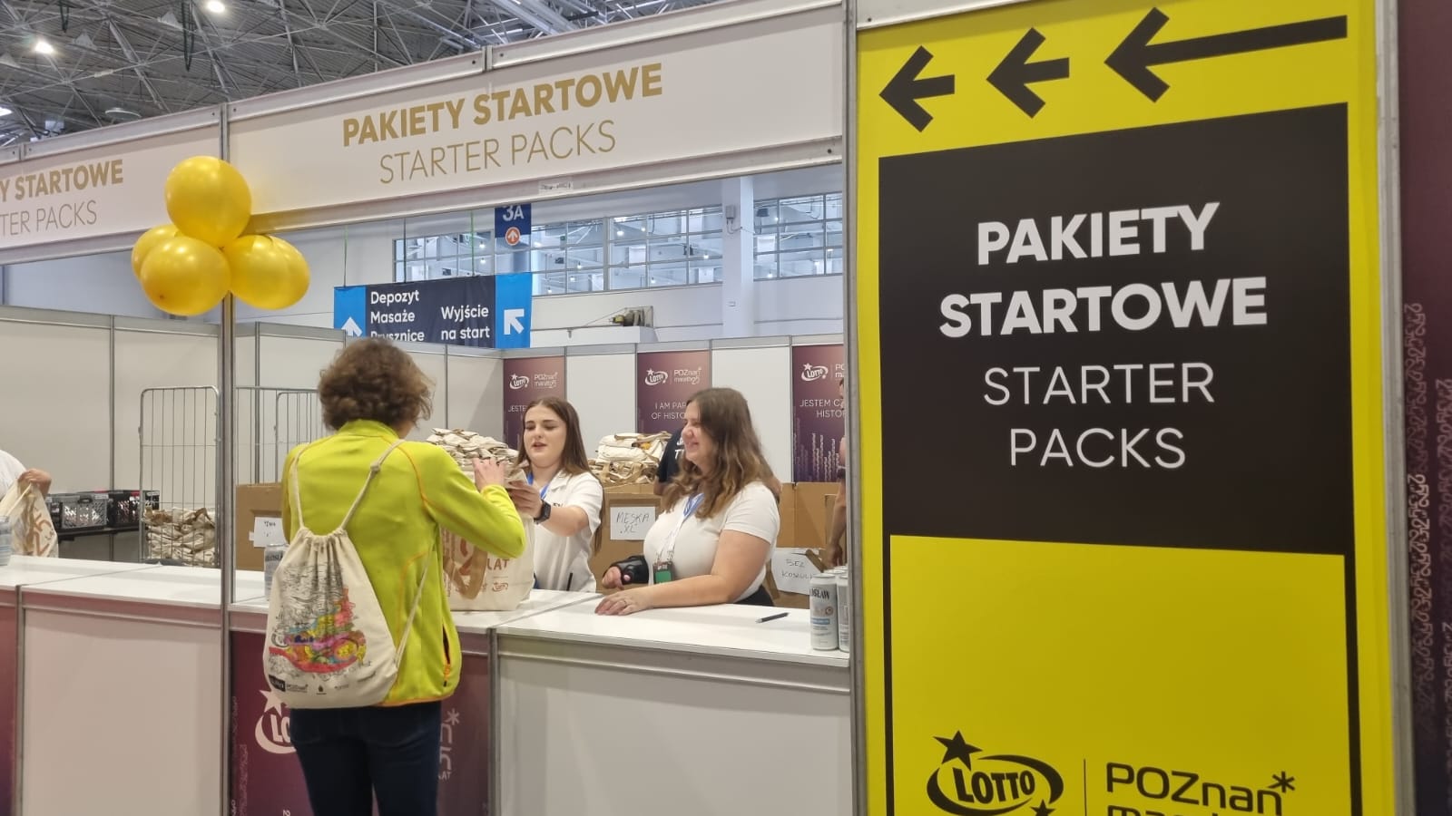odbierają pakiety maraton - Magdalena Konieczna  - Radio Poznań